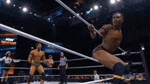 a man in a wrestling ring with a sign that says aew rampage on it