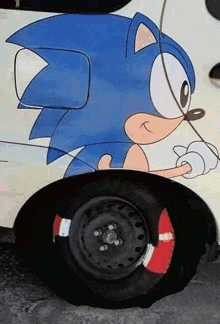 a car with a sonic the hedgehog sticker on the side of it .