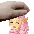 a cartoon girl wearing a pink hijab and a pink scarf is being patted on the head by a hand .