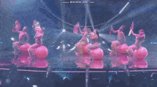 a group of pink balloons on a stage with the words www.bandicam.com on the bottom right