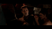 a man and two women laying on a bed with a pile of money behind them