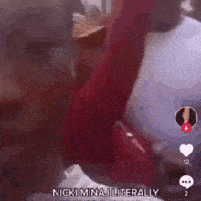 a close up of a person 's arm with the words `` nicki minaj literally '' on the bottom .