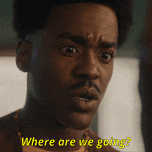 a close up of a man 's face with the words where are we going on the bottom