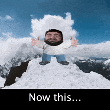 a man with a beard is standing on top of a snow covered mountain