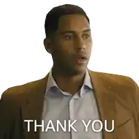 a man in a suit says " thank you " on a white background