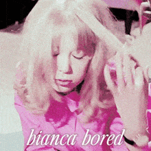 a girl in a pink shirt with the words " bianca bored " below her