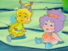 a cartoon drawing of a yellow and purple doll