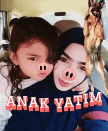 a picture of a little girl and a dog with anak yatim written in red