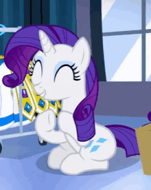 a white pony with a purple mane and tail