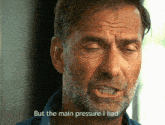 a man with a beard is talking about the main pressure he had