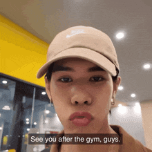 a man wearing a tan nike hat says " see you after the gym guys "