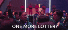a group of people are dancing in a room with the words one more lottery written in the corner .