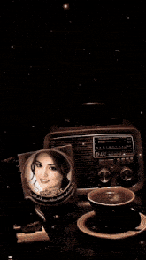 a princess cd sits on a table next to a radio and a cup of coffee