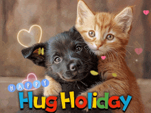 a picture of a puppy and kitten with the words happy hug holiday