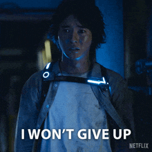 a man with a backpack says i won 't give up on a netflix poster