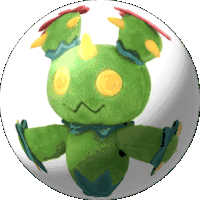 a green stuffed animal with yellow eyes is sitting in a white sphere