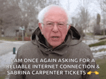 a man in a grey jacket says i am once again asking for a reliable internet connection