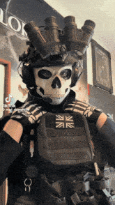 a person wearing a skull mask and a helmet with a british flag patch