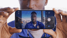 Taking Photo With The Phone Marques Brownlee GIF - Taking Photo With The Phone Marques Brownlee Clicking The Button GIFs