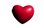 two heart shaped pillows with a joker face on them .