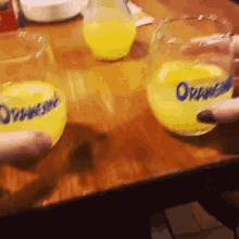 Orangina GIF - Cheers Orange Juice GIFs