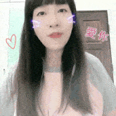 a woman with chinese writing on her face and a heart next to her