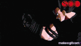 a gif of a person holding a microphone with the words make a gif.com at the bottom