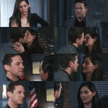 a man and a woman kissing in front of a window