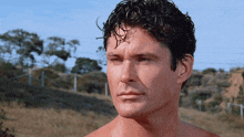 a close up of a man 's face without a shirt