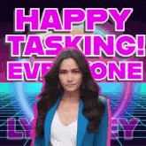 a woman in a blue jacket stands in front of a sign that says " happy tasking everyone "