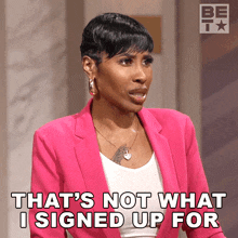a woman in a pink jacket is saying that 's not what i signed up for