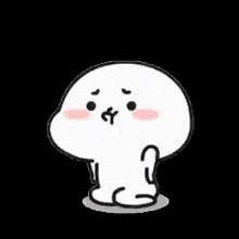 a white cartoon character with a sad look on his face is sitting on the ground .