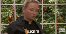 a woman says " i like it " while holding a knife