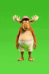 a cartoon moose wearing a red hat that says ' donald trump ' on it