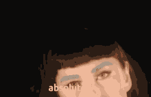 a blurry picture of a person with the word absolutely written below it