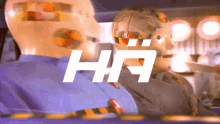 two crash test dummies are sitting in a car with the letters h and a on the bottom