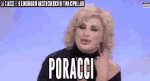 a woman with blonde hair is wearing a black turtleneck and the word poracci is on her face .