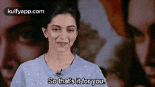 a woman is talking into a microphone and saying `` so that 's it for you '' .