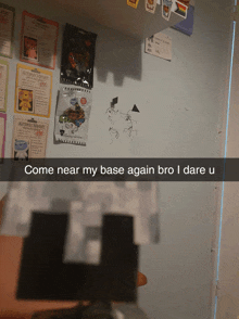 a picture of a person 's base with the words come near my base again bro i dare u on the bottom