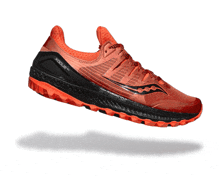 a pair of orange and black running shoes that say everrun