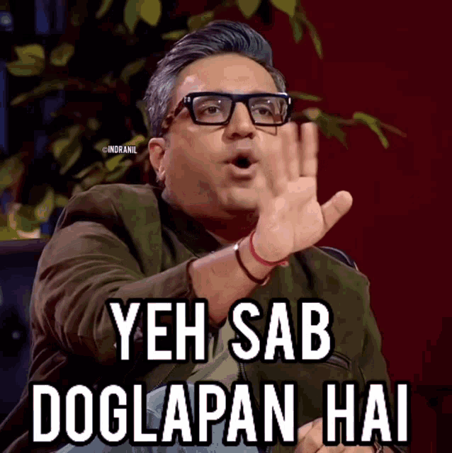 a man wearing glasses is making a funny face and says 