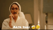 a woman with a bandage on her head says aaja hai