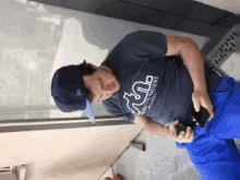a man wearing a t-shirt that says ' u.s. ' on it