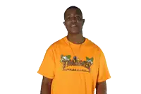 a young man wearing an orange thrasher t shirt