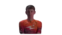 a man wearing an orange shirt that says human powered health on it
