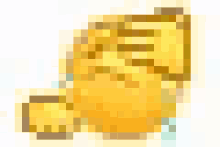 a close up of a yellow hand with a fist .