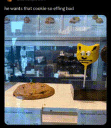 a picture of a cookie and a lollipop with the caption he wants that cookie so effing bad