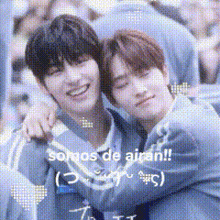 a couple of young men hugging each other with the words somos de arian written on the bottom