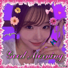 a picture of a girl with flowers on her head and the words good morning