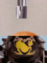 a close up of a cartoon character with a yellow face
